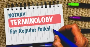 Notebook labeled “Notary Terminology for Regular Folks” with a hand holding a marker.